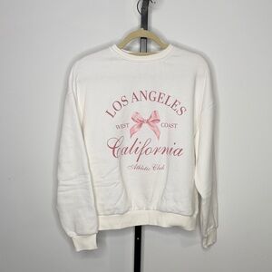 Edikted Los Angeles Graphic Cropped Sweatshirt – White/Pink